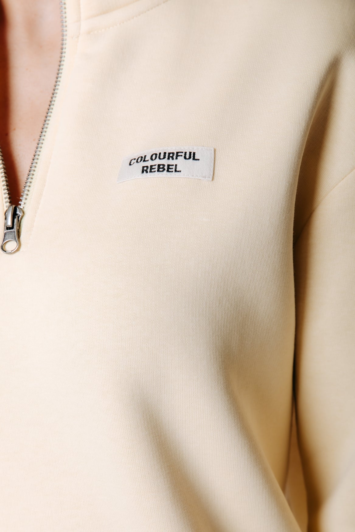Label Zip Sweat | Soft yellow