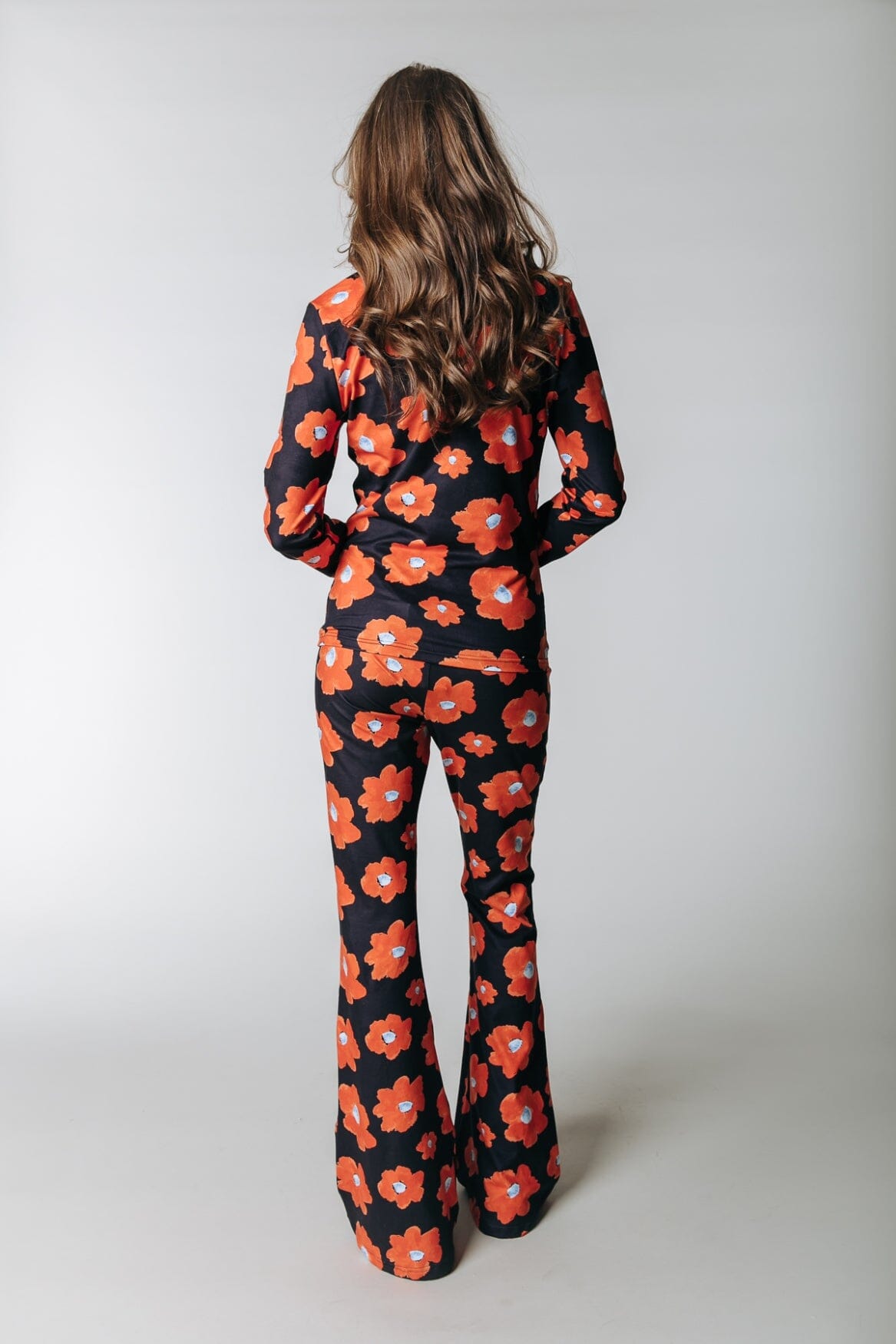 Colourful Rebel Flower Peached Flare Pants | Mandarin Orange