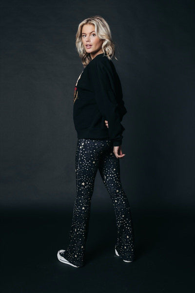 Colourful Rebel Cosmic Peached Flare Pants | Black 
