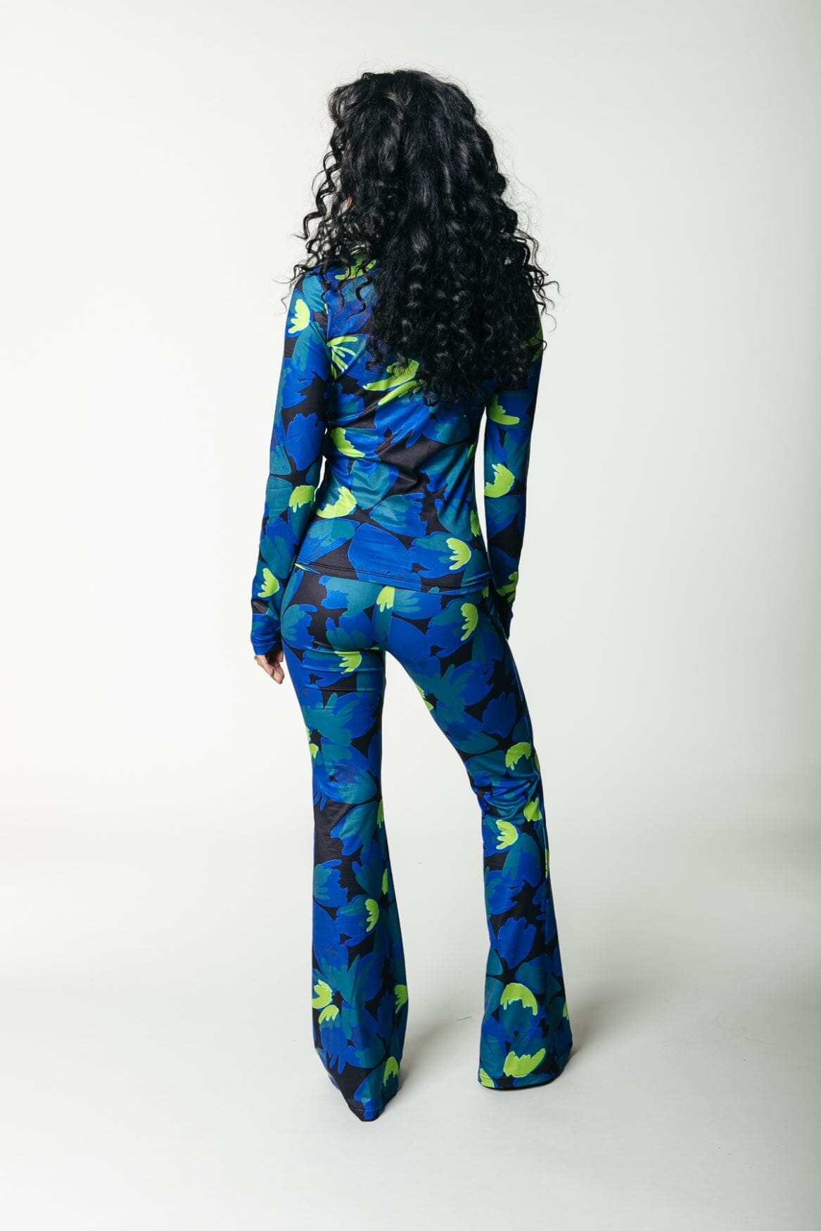 Colourful Rebel Moved Flower Peached Extra Flare Pants | Vibrant Blue